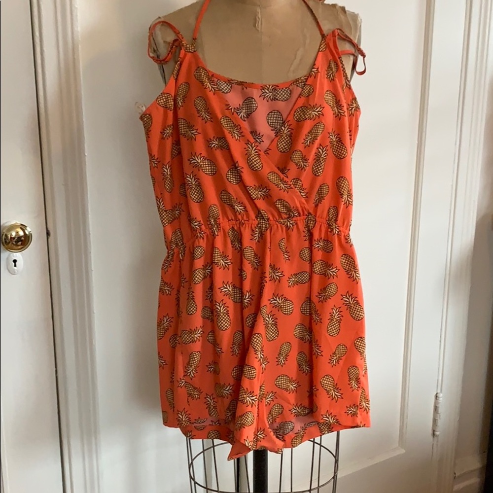 Salmon pineapple patterned romper